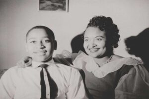 Emmett Till and his mother, Mamie Till-Mobley, at home in Chicago. (Photo from the collection of the Smithsonian National Museum of African American History and Culture, gift of the Mamie Till Mobley family)